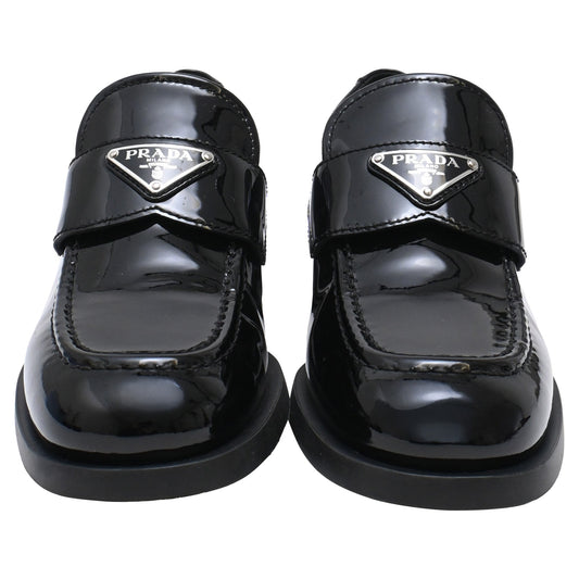 Women's Prada Triangle Logo Loafers in Black Patent Leather