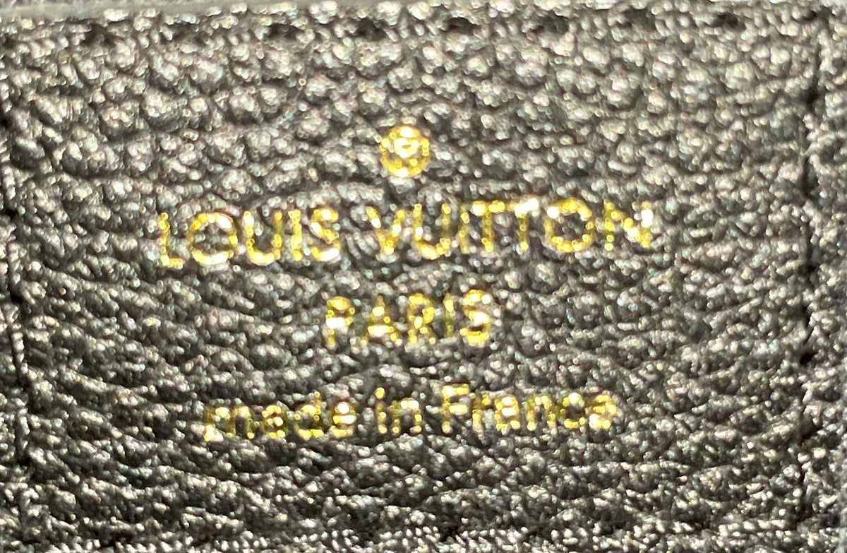 Daily Pouch Monogram Empreinte Leather