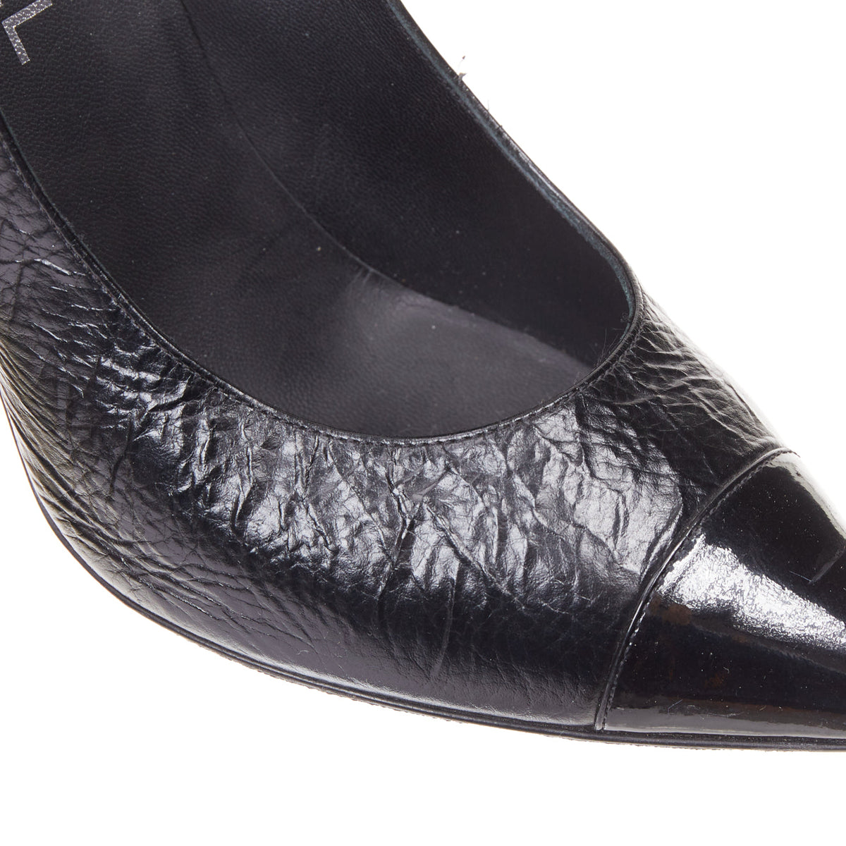 Women's Chanel Sculpted Sailor Knot black leather CC cap toe pumps
