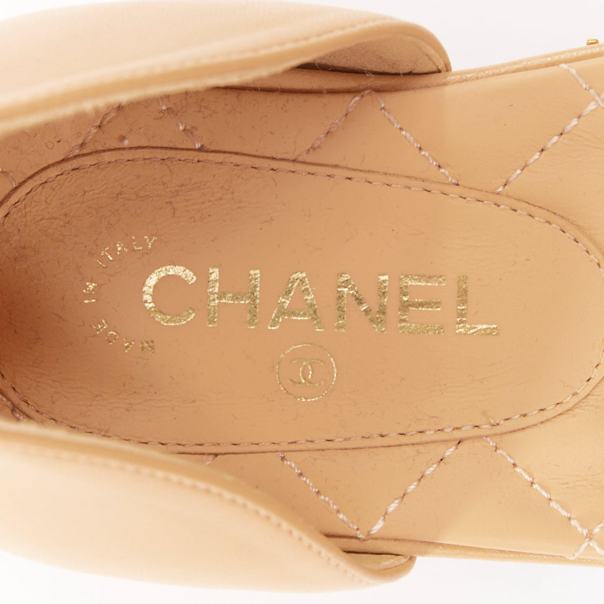 Women's Chanel nude quilted lambskin CC grosgrain cap toe pumps