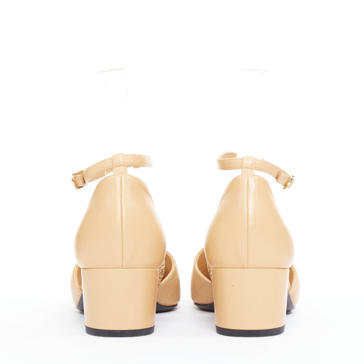 Women's Chanel nude quilted lambskin CC grosgrain cap toe pumps