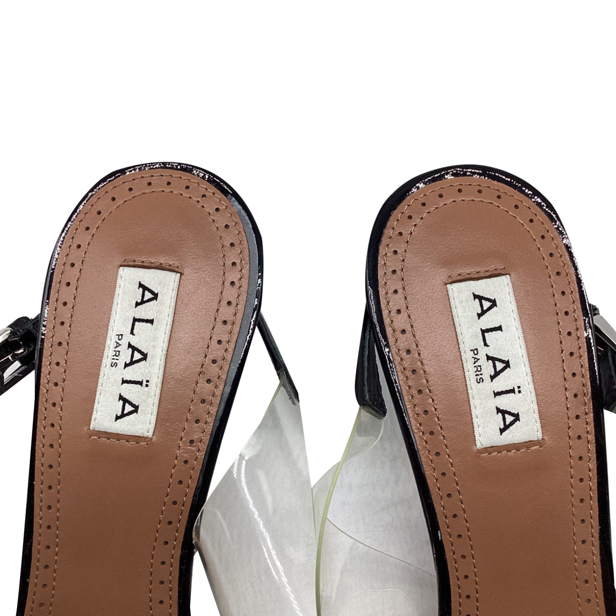 Women's Alaïa Cœur Slingback Pumps in Black PVC